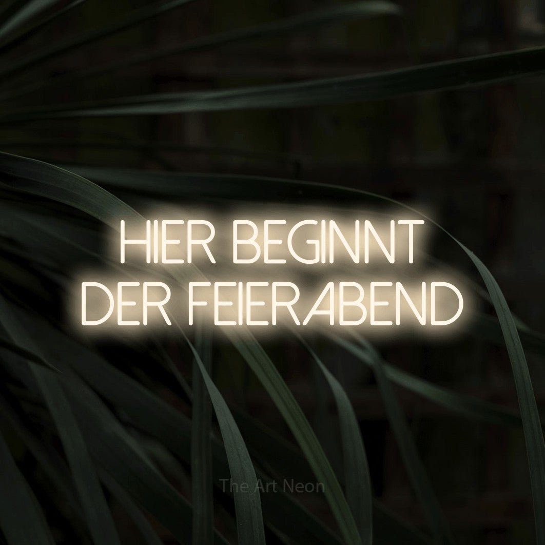 LED neon sign reading “Hier beginnt der Feierabend”, arranged in 2 lines.