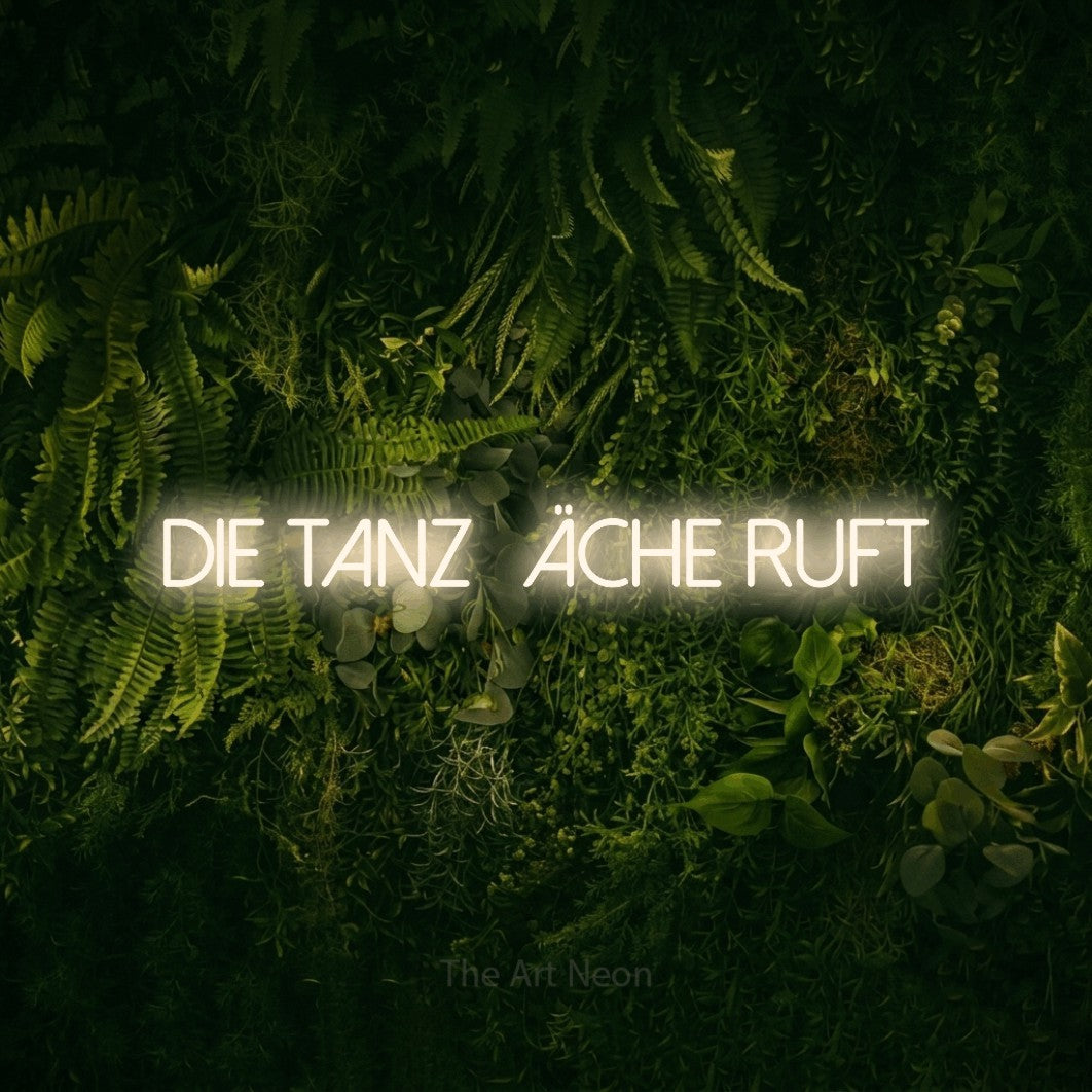 LED neon sign reading “die tanzfläche ruft”, arranged in a single line.