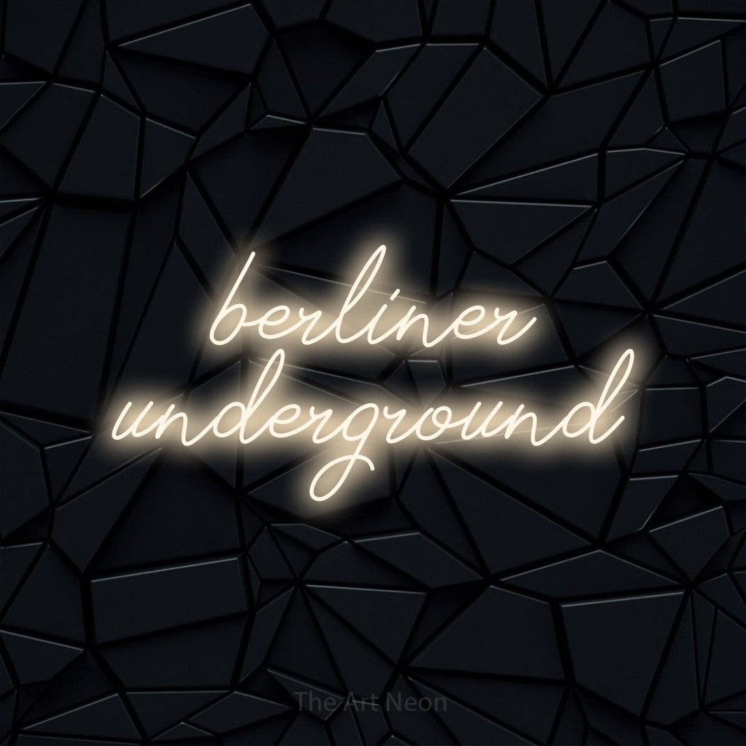 LED neon sign reading “berliner underground”, arranged in 2 lines.