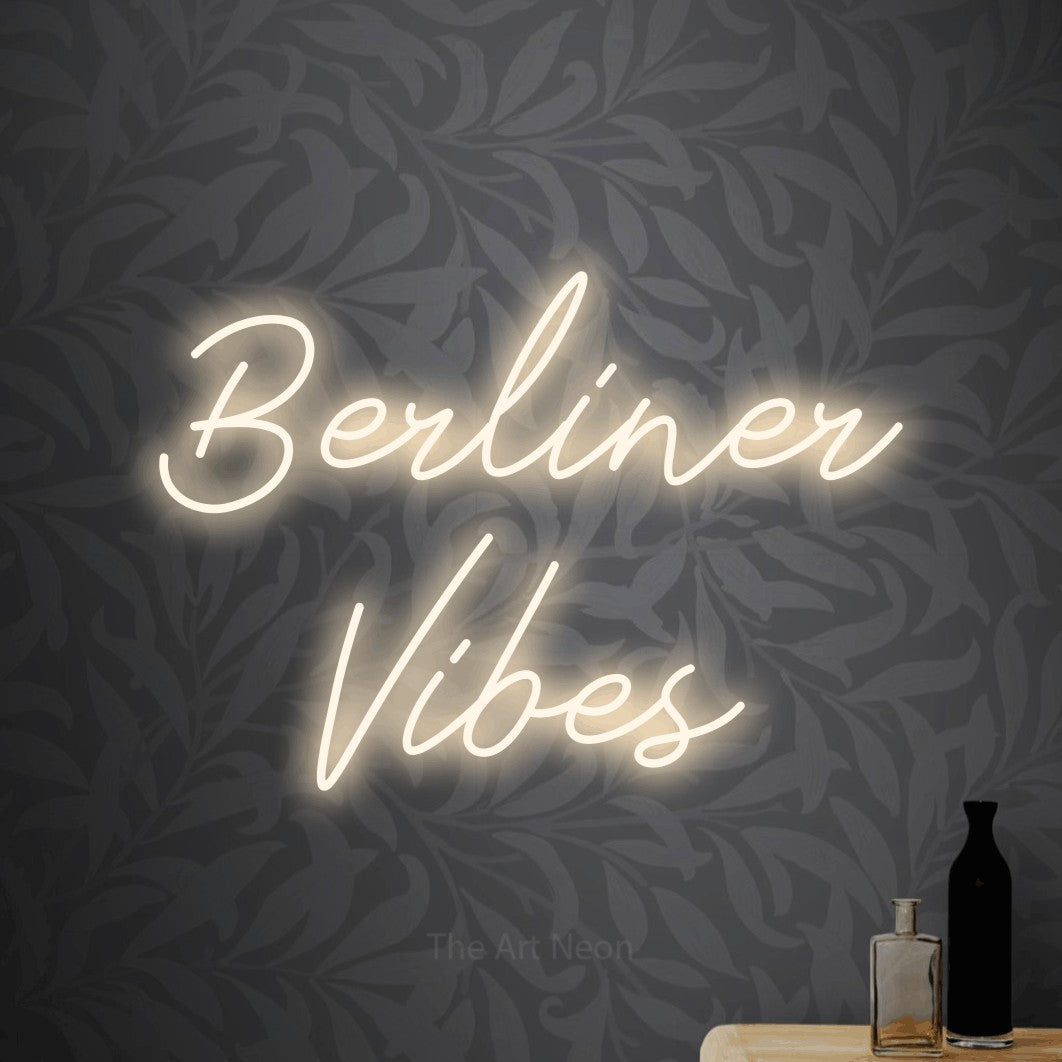 LED neon sign reading “Berliner Vibes”, arranged in 2 lines.