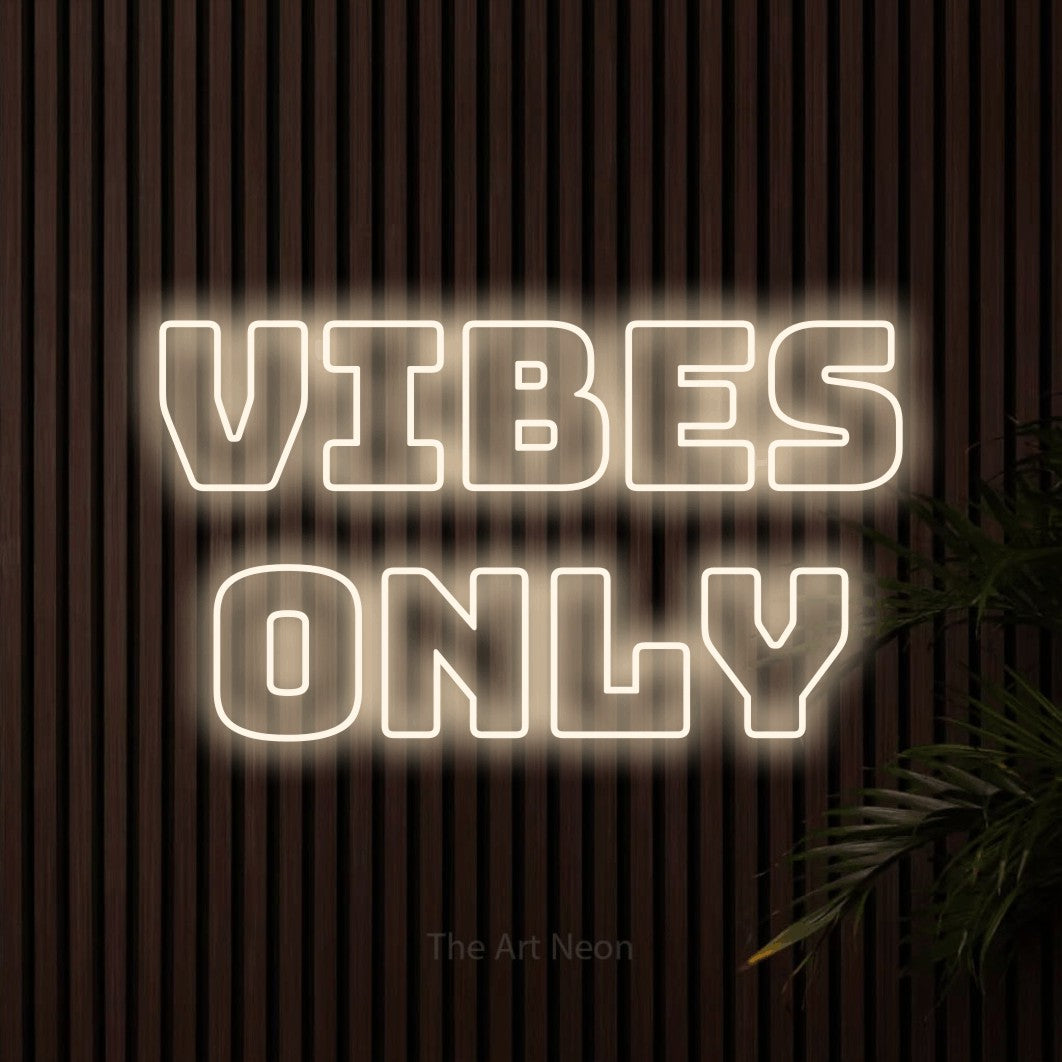 LED neon sign reading “vibes only”, arranged in 2 lines.