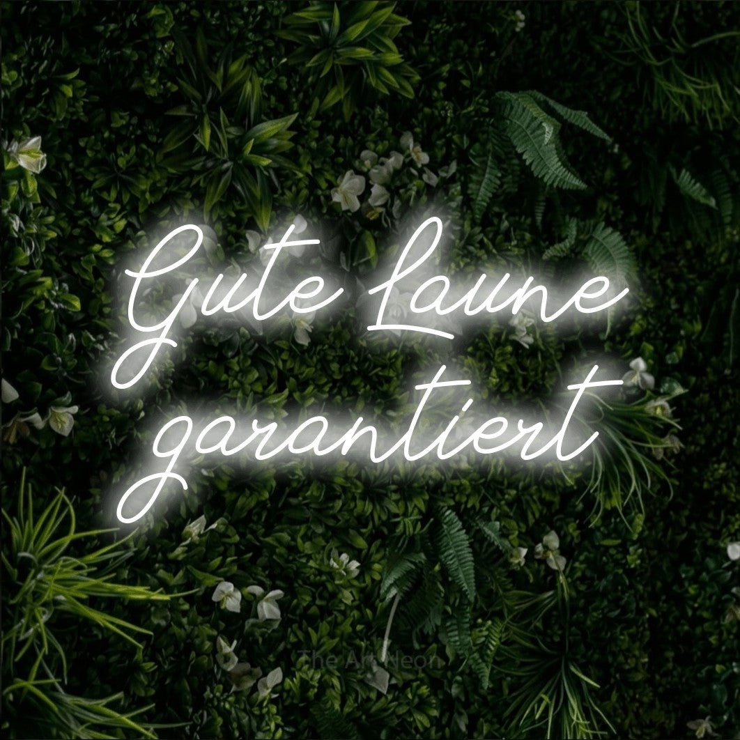 LED neon sign reading “Gute Laune garantiert”, arranged in 2 lines.