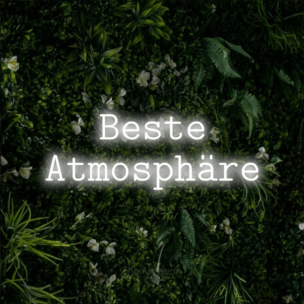 LED neon sign reading “Beste Atmosphäre”, arranged in 2 lines.