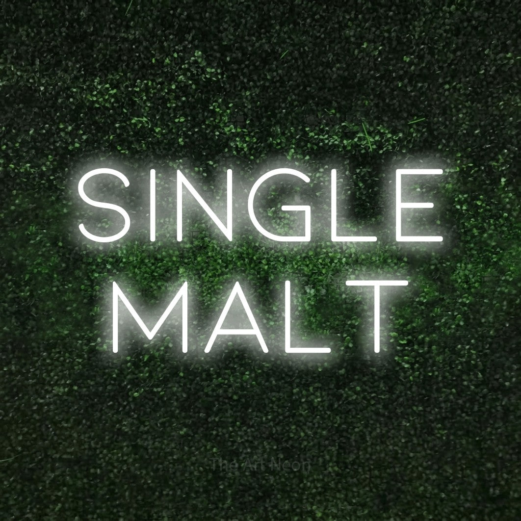 LED neon sign reading “single malt”, arranged in 2 lines.