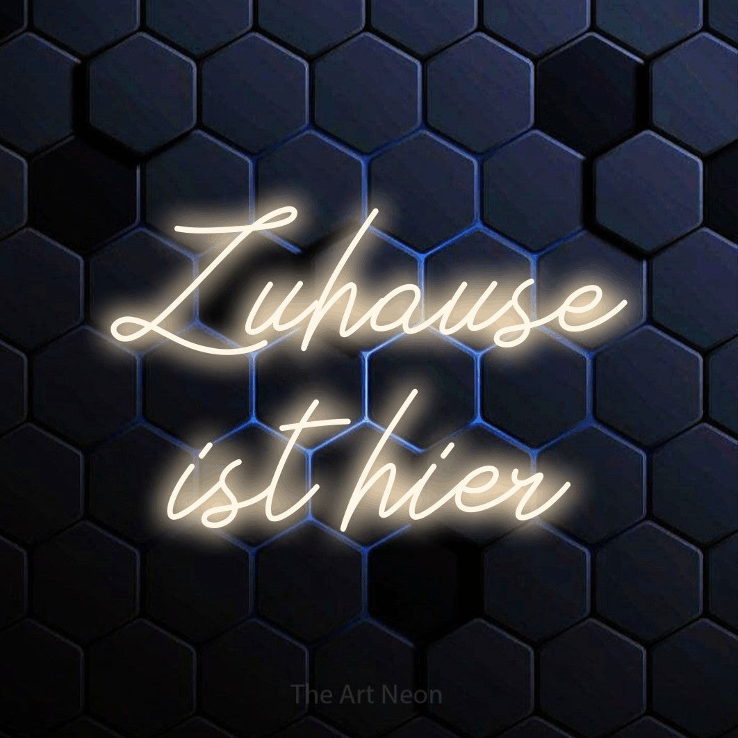 LED neon sign reading “Zuhause ist hier”, arranged in 2 lines.