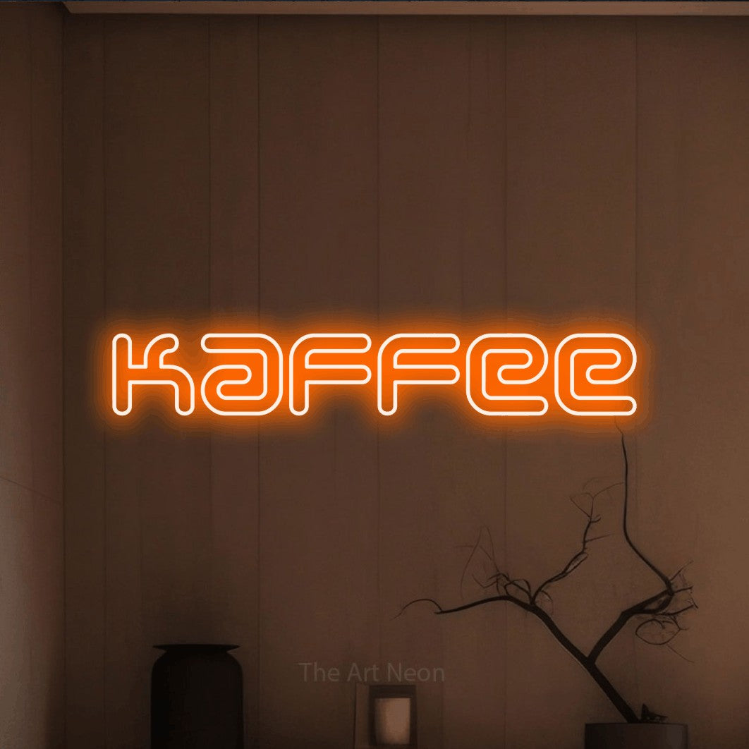 LED neon sign reading “kaffee”, arranged in a single line.