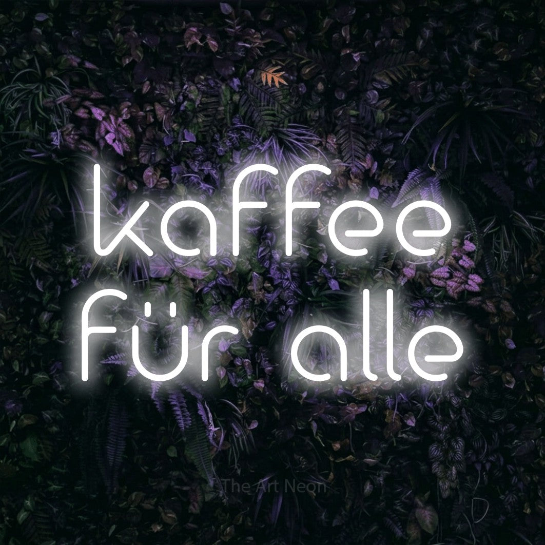 LED neon sign reading “kaffee für alle”, arranged in 2 lines.