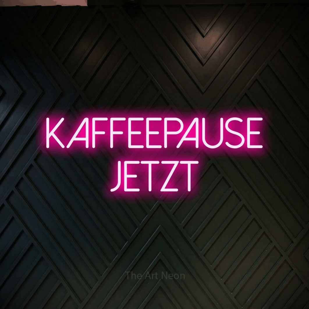 LED neon sign reading “kaffeepause jetzt”, arranged in 2 lines.