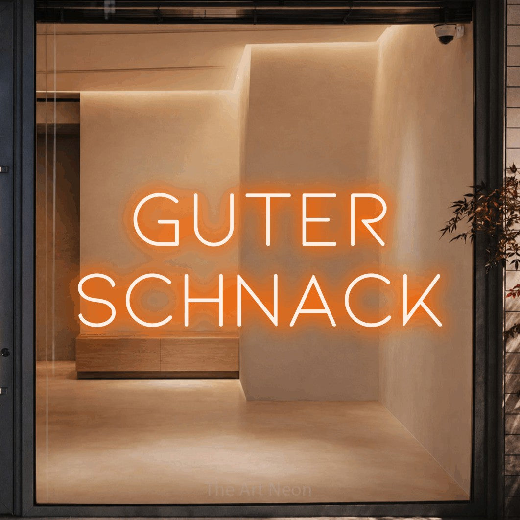 LED neon sign reading “Guter Schnack”, arranged in 2 lines.