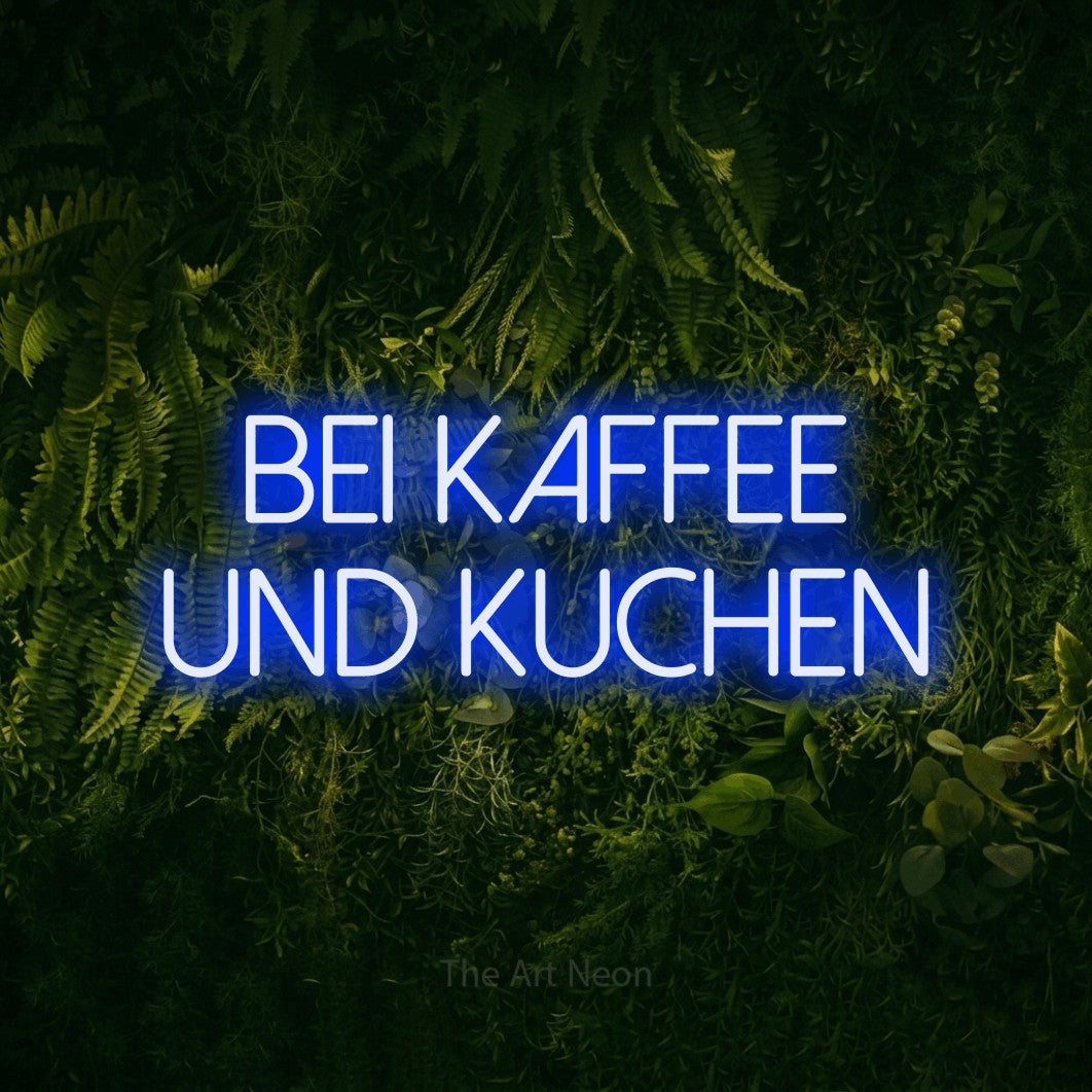 LED neon sign reading “BEI KAFFEE UND KUCHEN”, arranged in 2 lines.