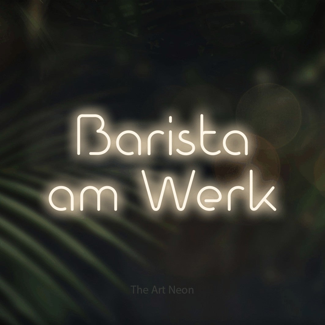 LED neon sign reading “Barista am Werk”, arranged in 2 lines.