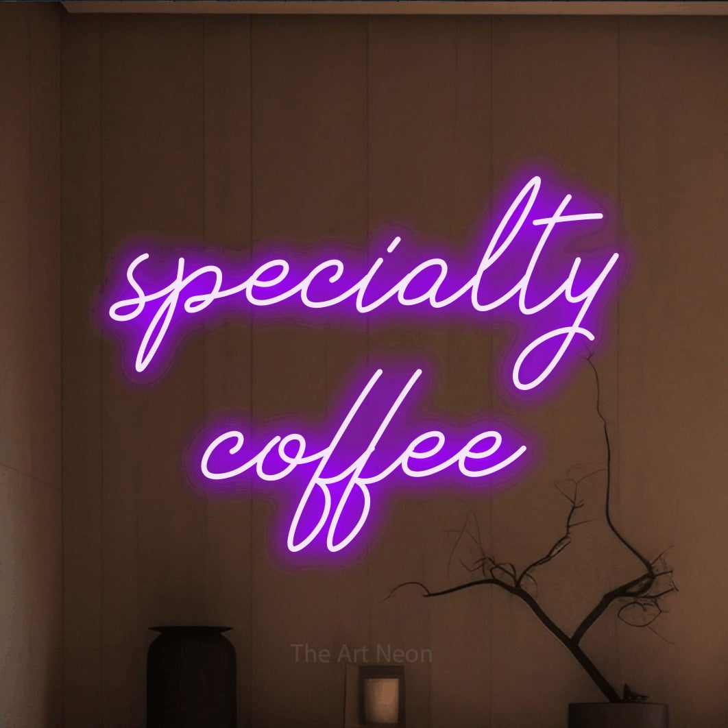 LED neon sign reading “specialty coffee”, arranged in 2 lines.