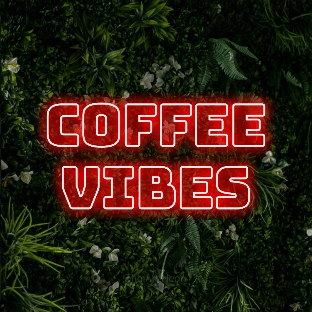 LED neon sign reading “Coffee vibes”, arranged in 2 lines.