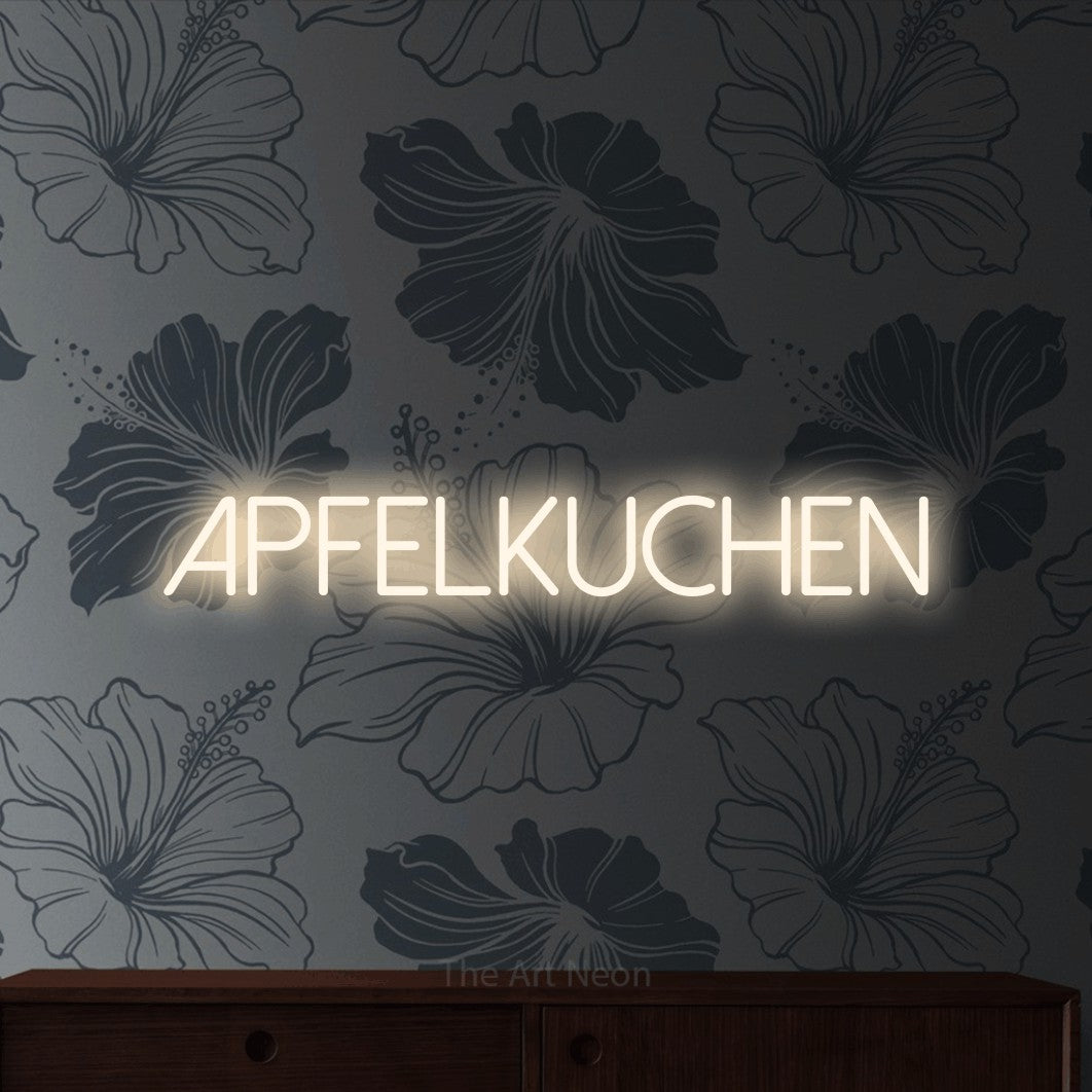 LED neon sign reading “Apfelkuchen”, arranged in a single line.