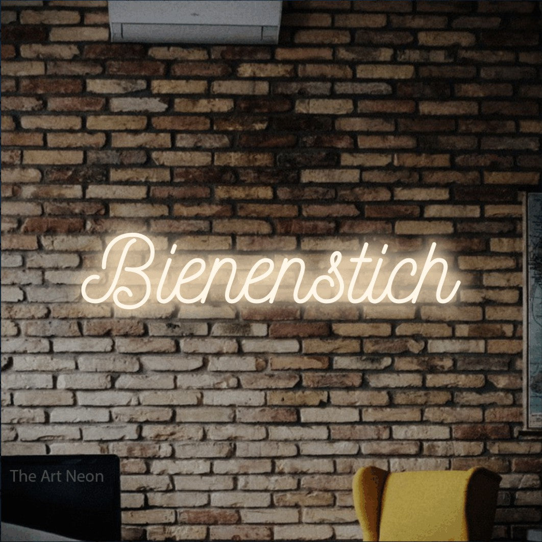 LED neon sign reading “Bienenstich”, arranged in a single line.