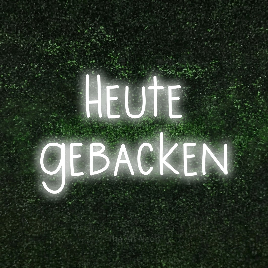 LED neon sign reading “Heute gebacken”, arranged in 2 lines.