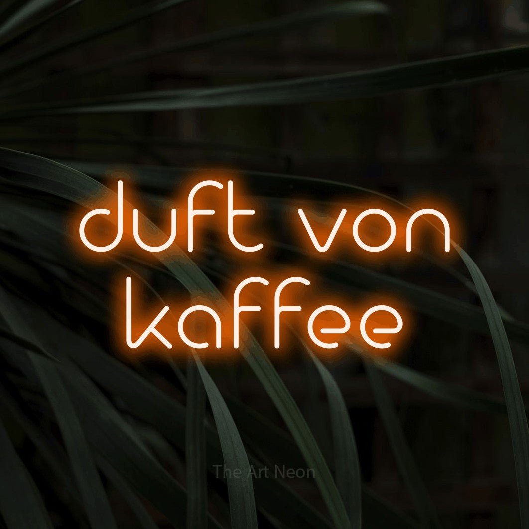 LED neon sign reading “duft von kaffee”, arranged in 2 lines.