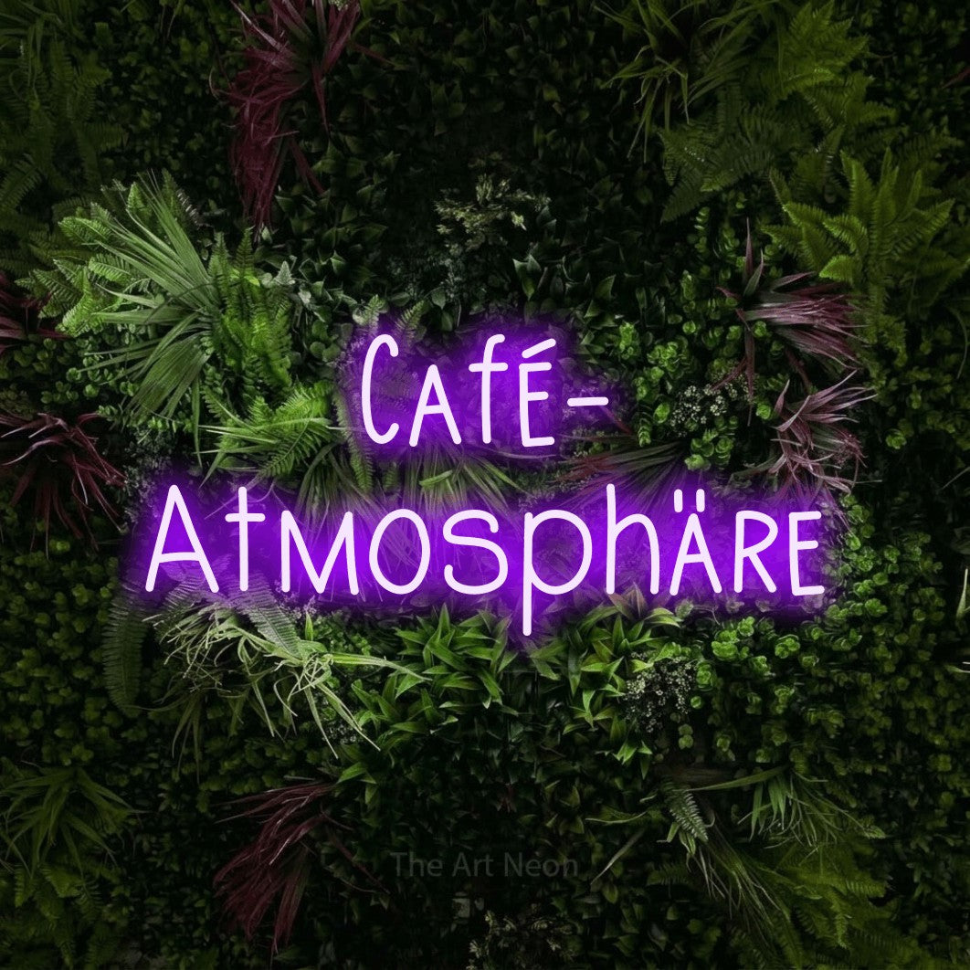 LED neon sign reading “Café- Atmosphäre”, arranged in 2 lines.