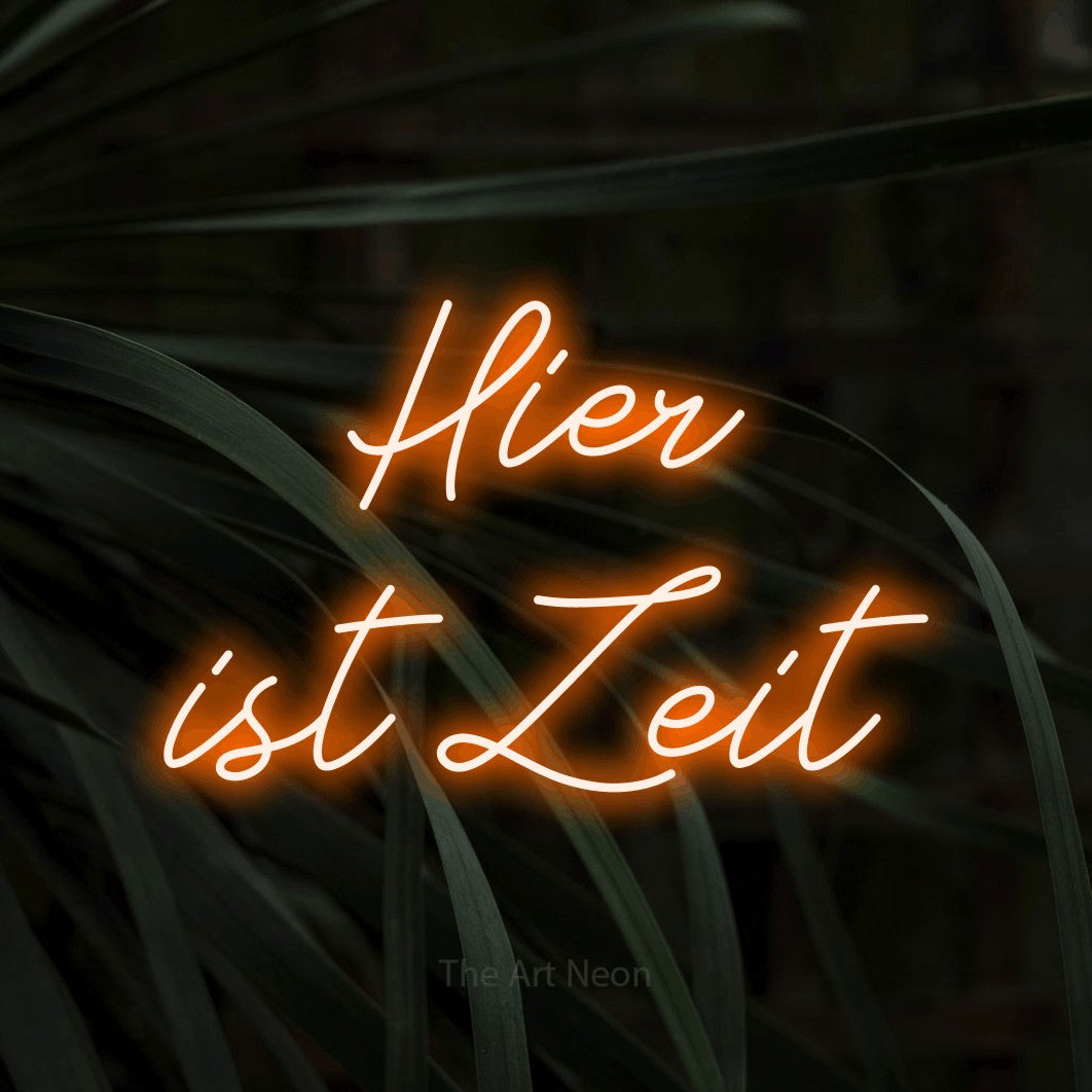 LED neon sign reading “Hier ist Zeit”, arranged in 2 lines.
