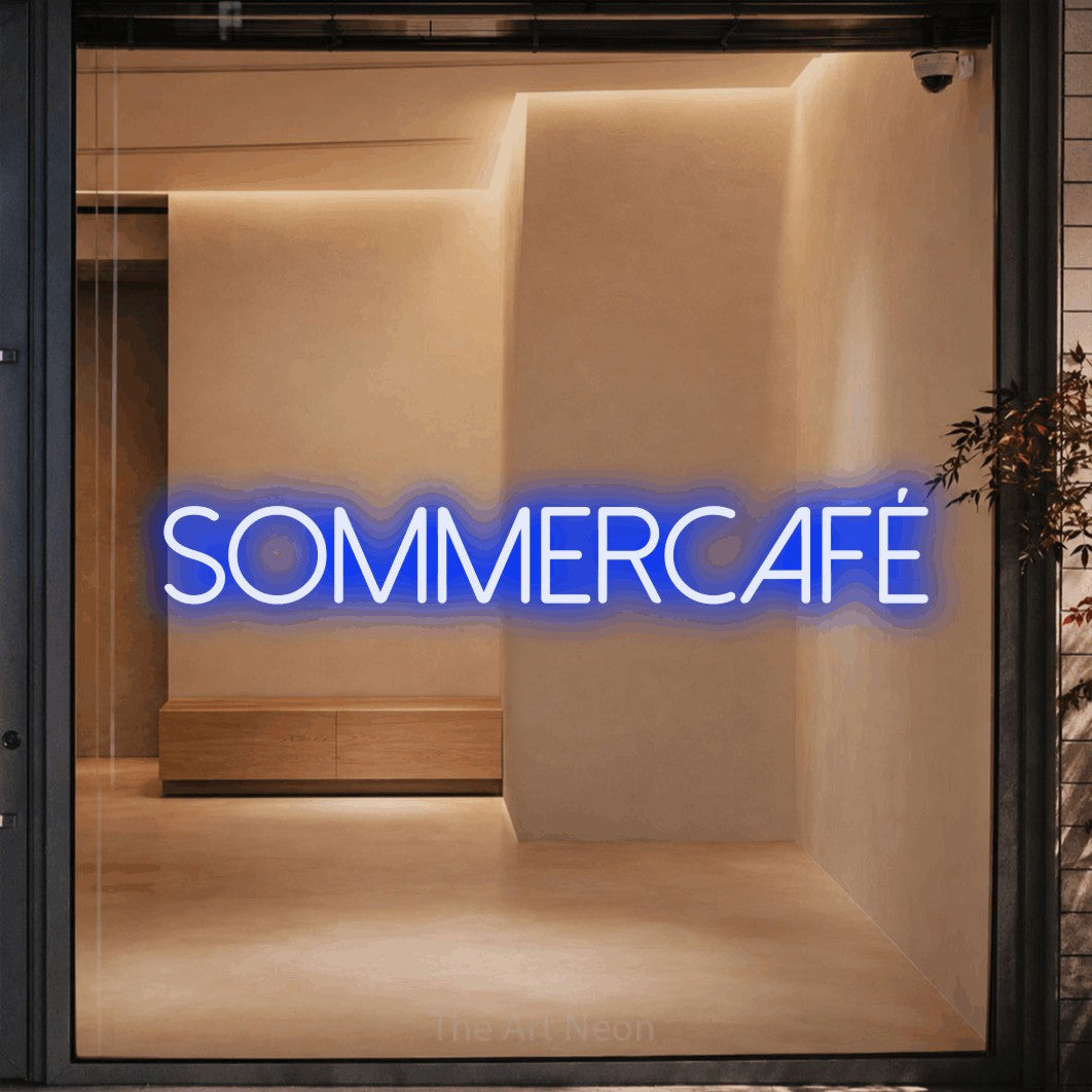 LED neon sign reading “SOMMERCAFÉ”, arranged in a single line.