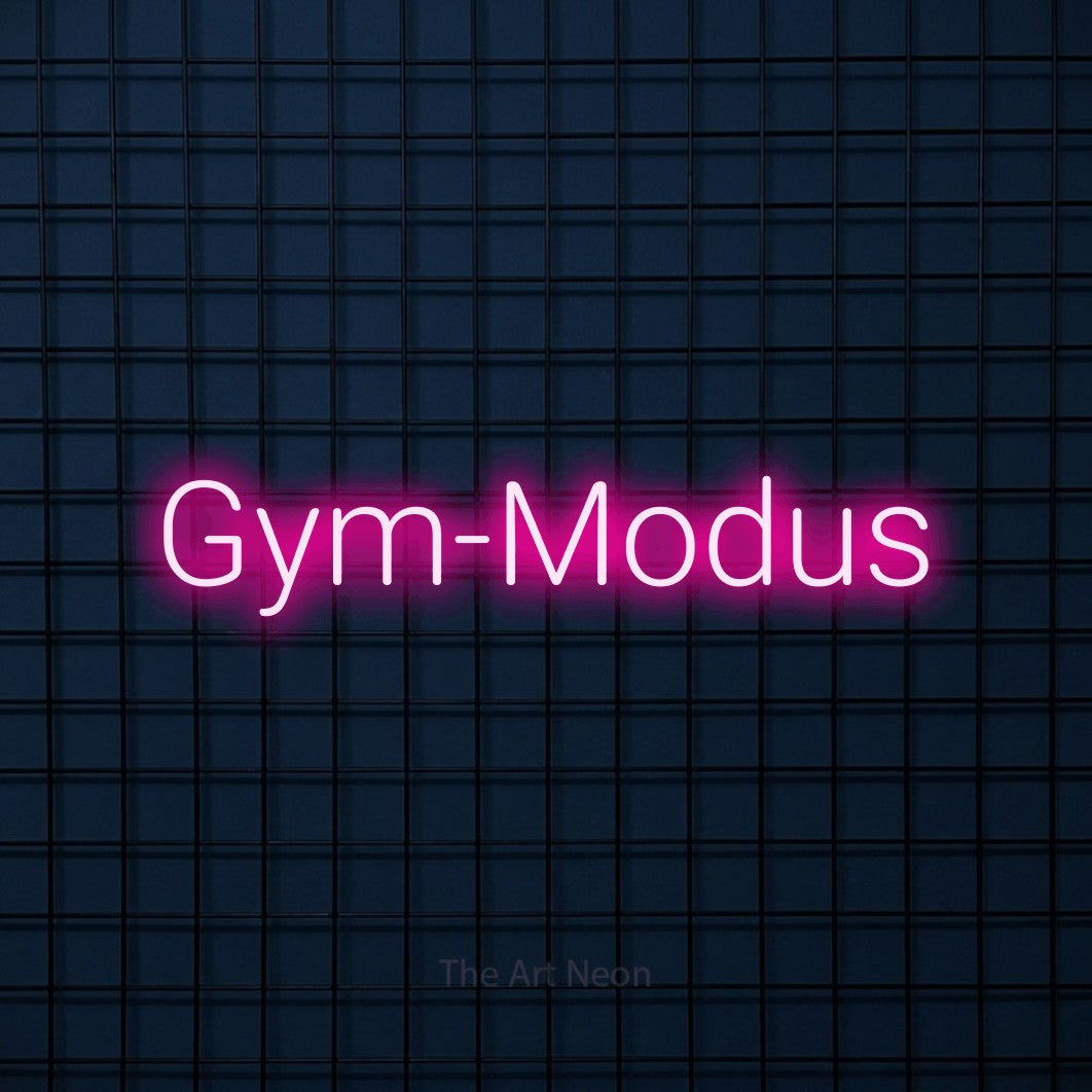 LED neon sign reading “Gym-Modus”, arranged in a single line.