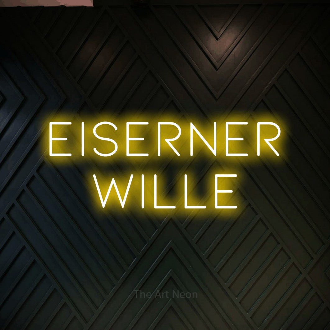 LED neon sign reading “eiserner wille”, arranged in 2 lines.