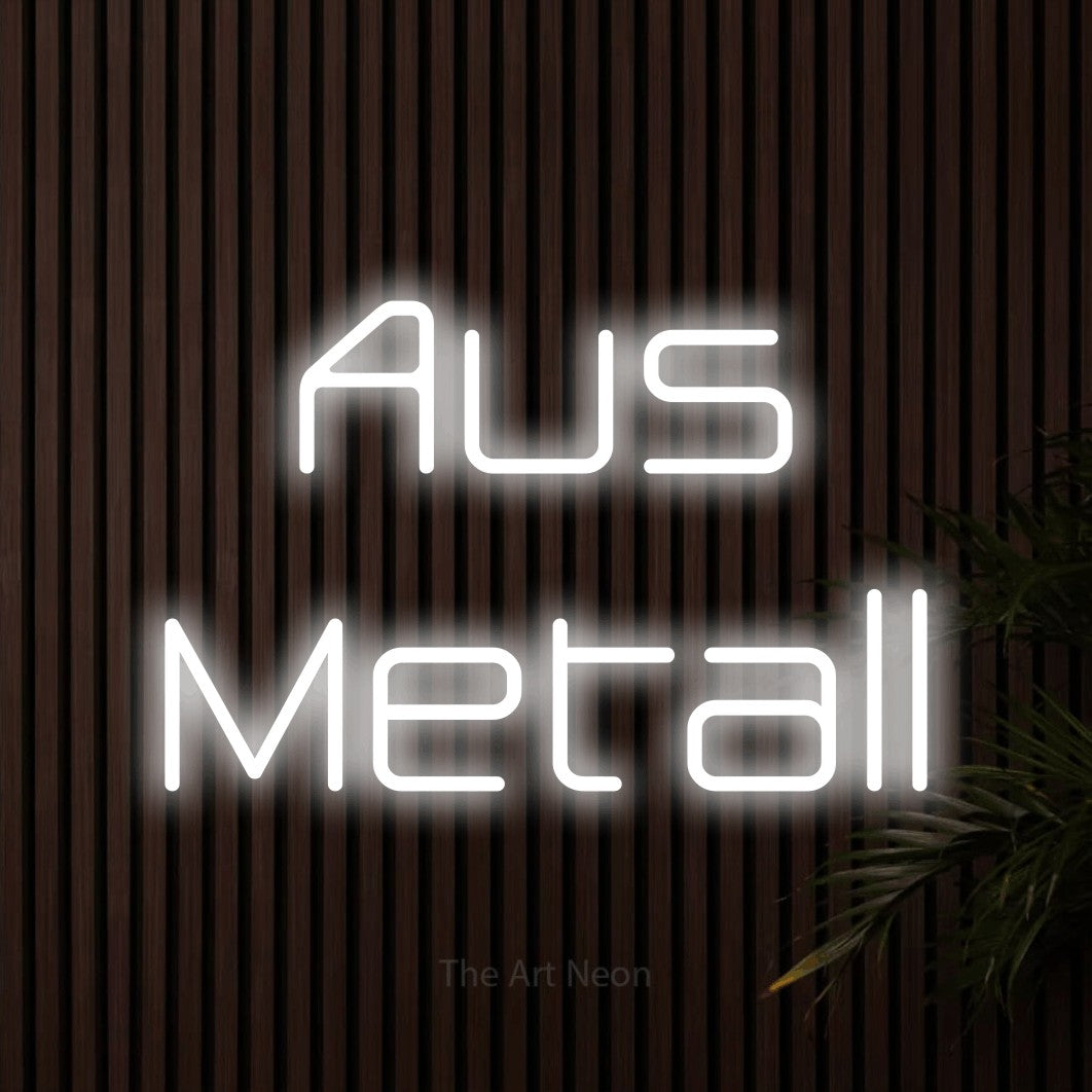 LED neon sign reading “Aus Metall”, arranged in 2 lines.