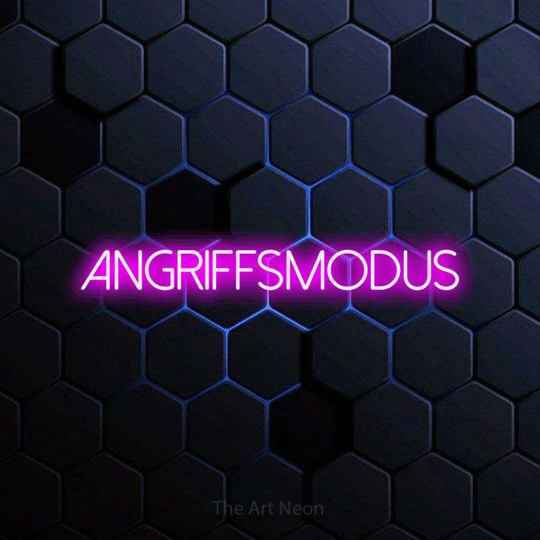 LED neon sign reading “Angriffsmodus”, arranged in a single line.