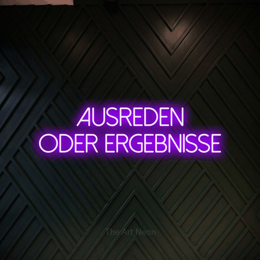 LED neon sign reading “AUSREDEN ODER ERGEBNISSE”, arranged in 2 lines.