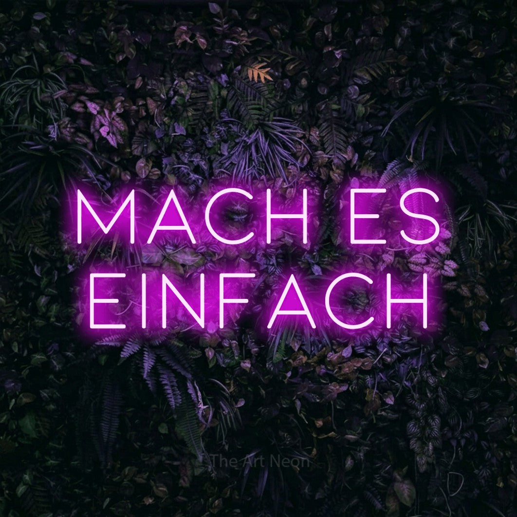 LED neon sign reading “MACH ES EINFACH”, arranged in 2 lines.