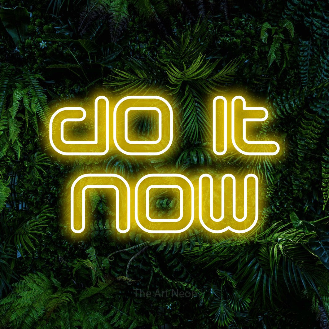 LED neon sign reading “do it now”, arranged in 2 lines.