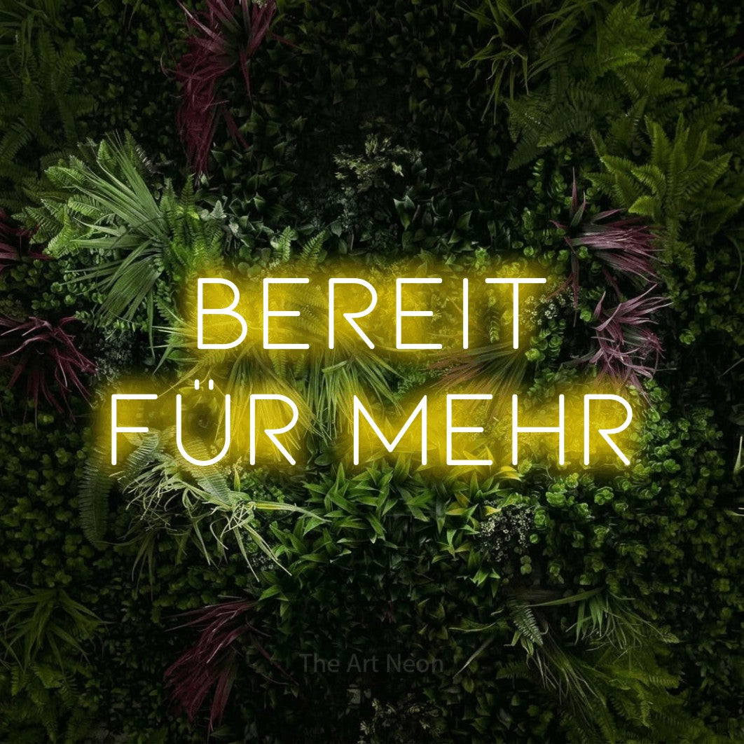 LED neon sign reading “Bereit für mehr”, arranged in 2 lines.