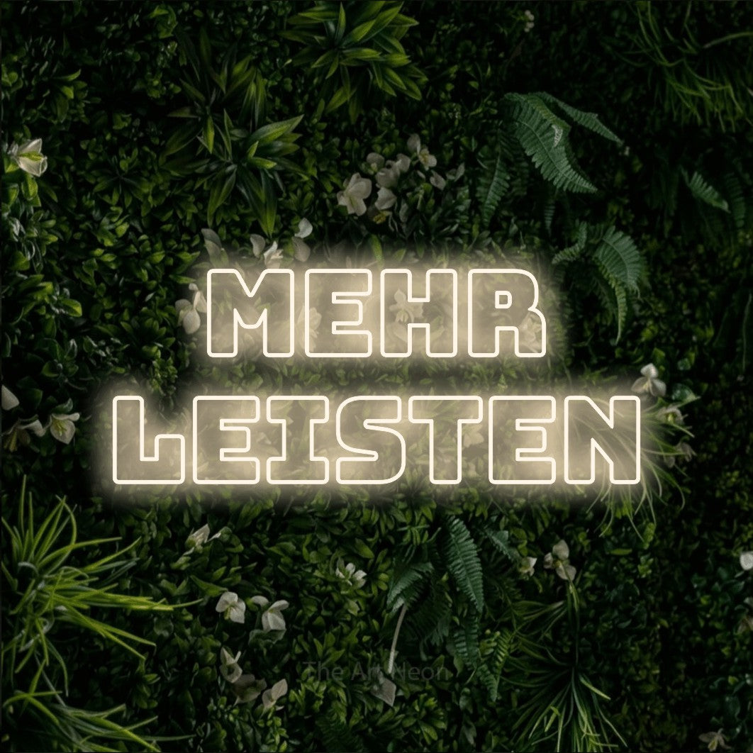 LED neon sign reading “mehr leisten”, arranged in 2 lines.