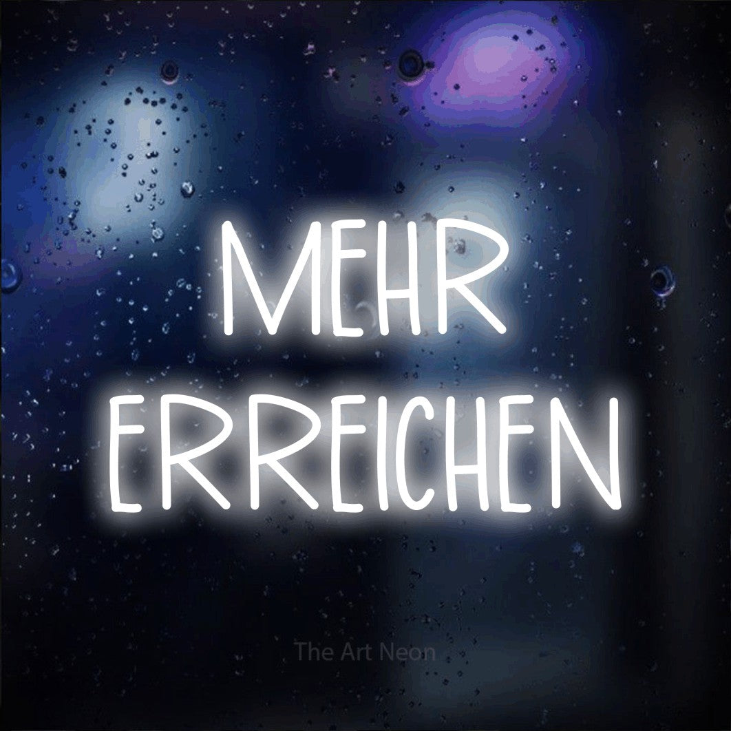 LED neon sign reading “MEHR ERREICHEN”, arranged in 2 lines.
