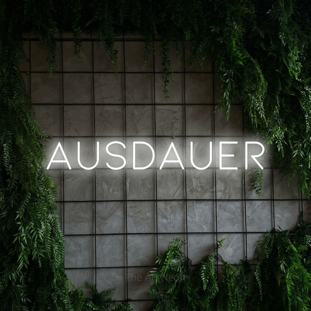 LED neon sign reading “AUSDAUER”, arranged in a single line.