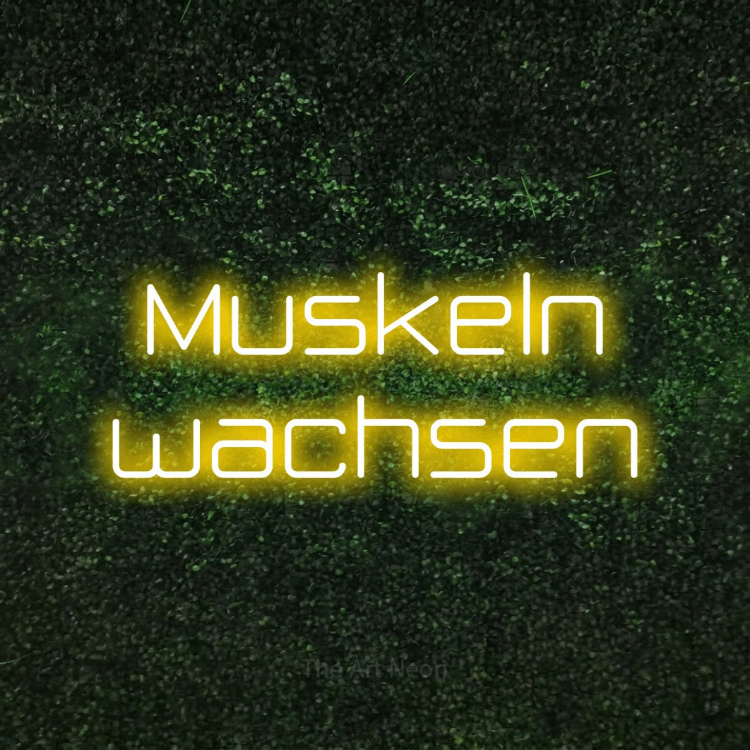 LED neon sign reading “Muskeln wachsen”, arranged in 2 lines.