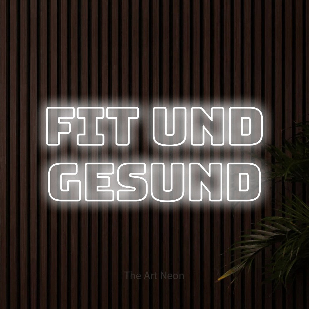 LED neon sign reading “FIT UND GESUND”, arranged in 2 lines.