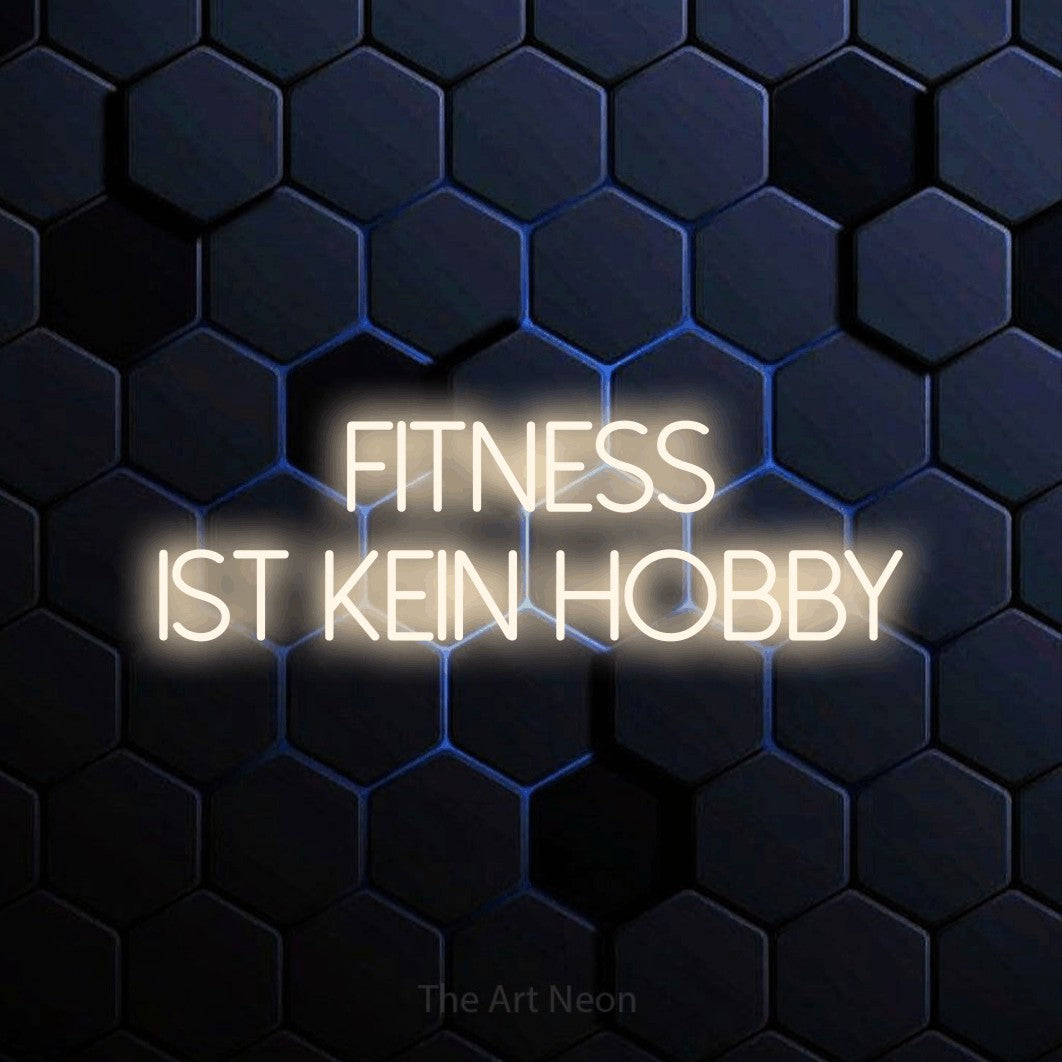 LED neon sign reading “Fitness ist kein Hobby”, arranged in 2 lines.