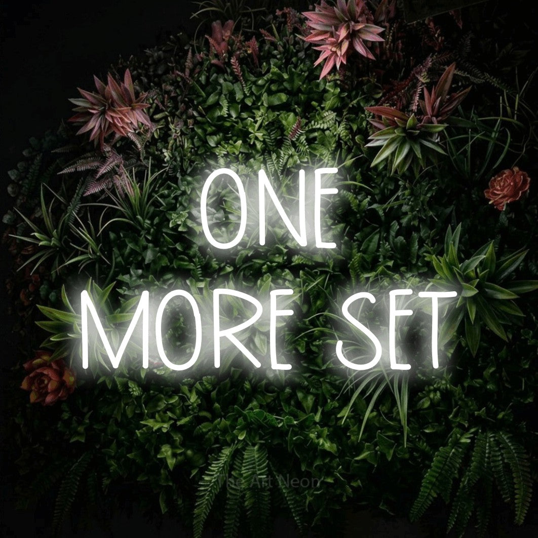LED neon sign reading “ONE MORE SET”, arranged in 2 lines.