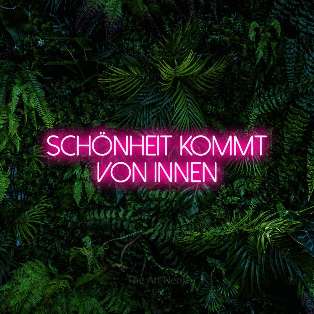 LED neon sign reading “Schönheit kommt von innen”, arranged in 2 lines.