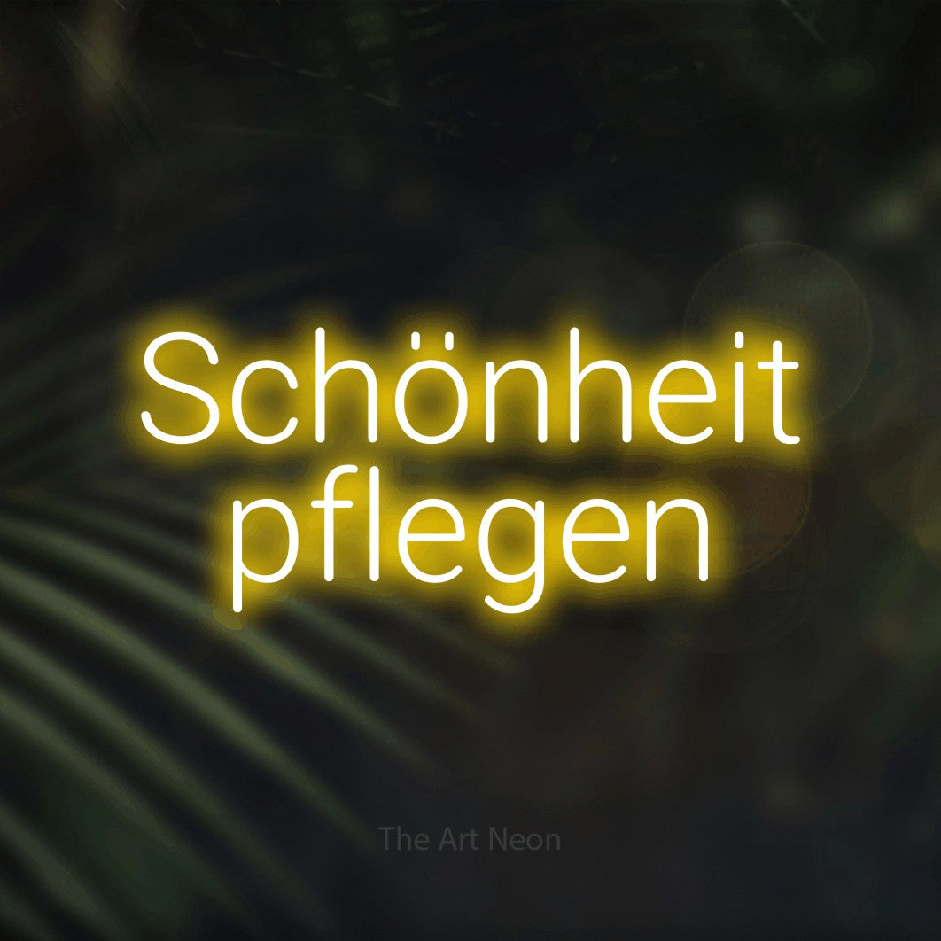 LED neon sign reading “Schönheit pflegen”, arranged in 2 lines.