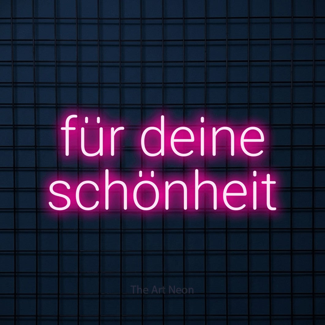 LED neon sign reading “für deine schönheit”, arranged in 2 lines.