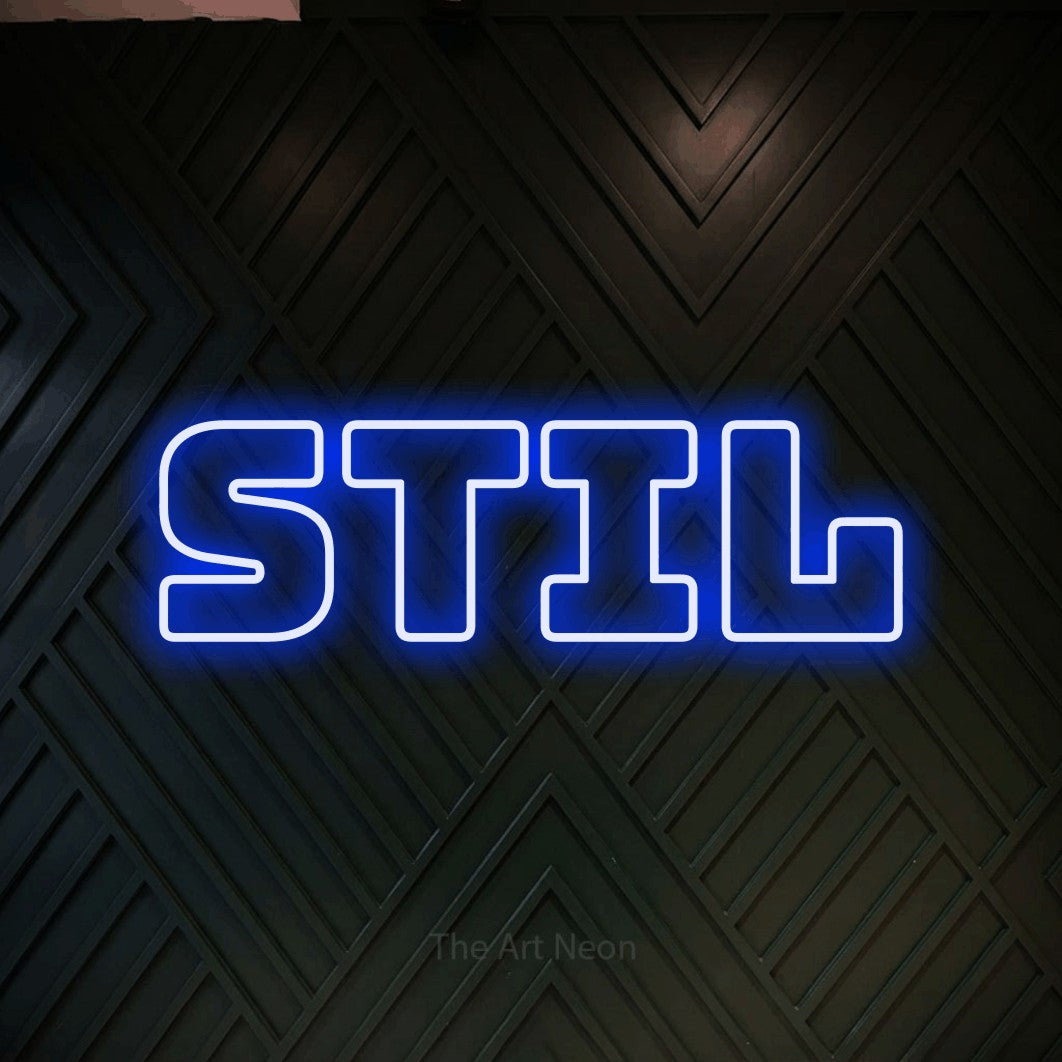 LED neon sign reading “Stil”, arranged in a single line.