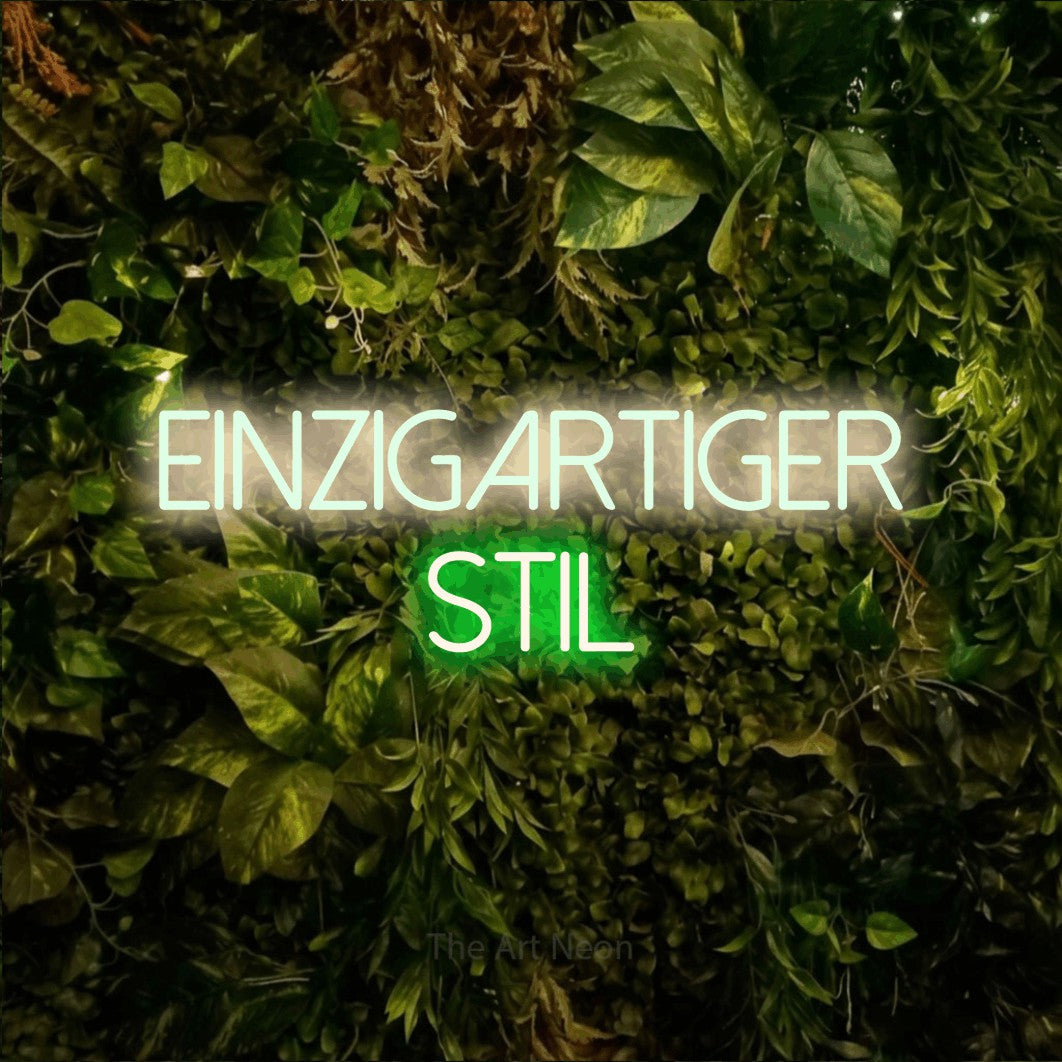 LED neon sign reading “Einzigartiger Stil”, arranged in 2 lines.