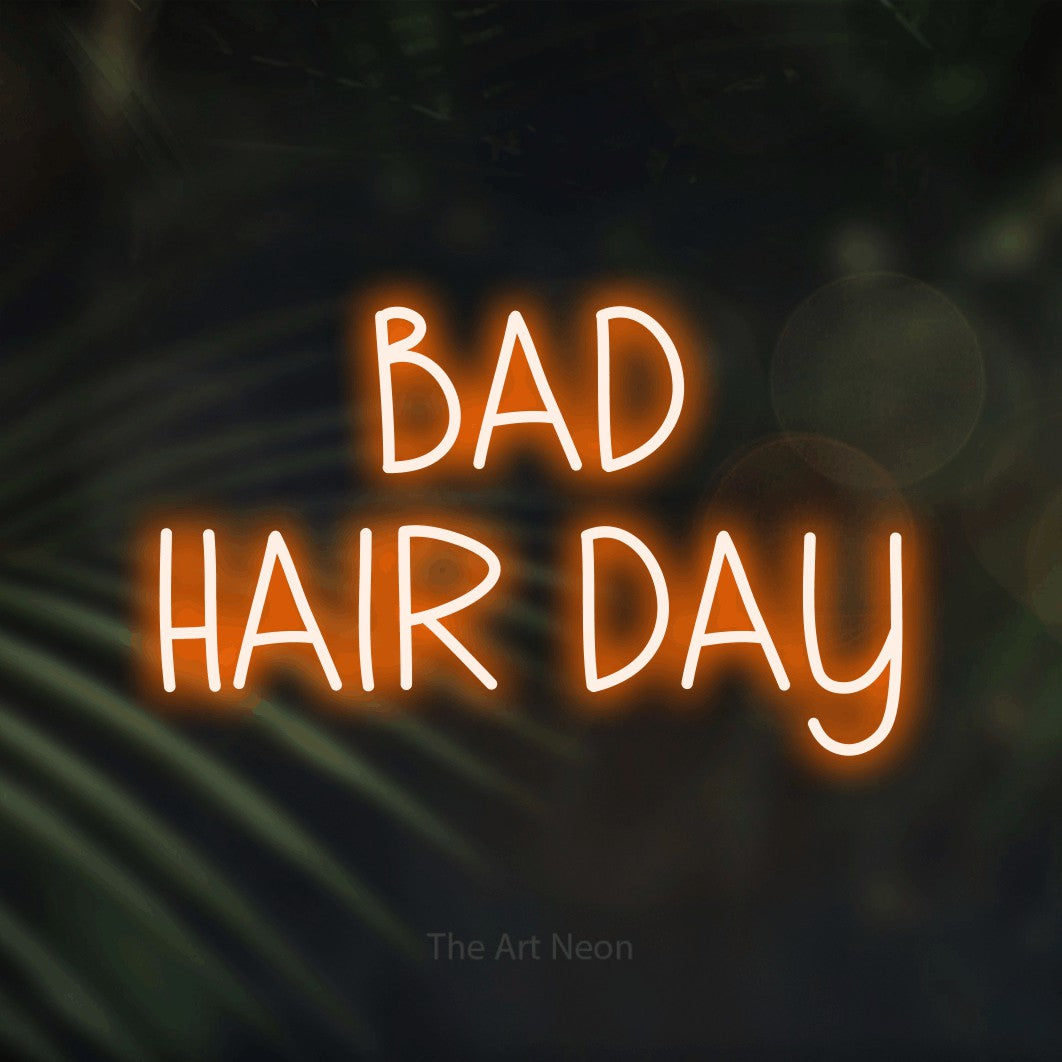 LED neon sign reading “BAD HAIR DAY”, arranged in 2 lines.