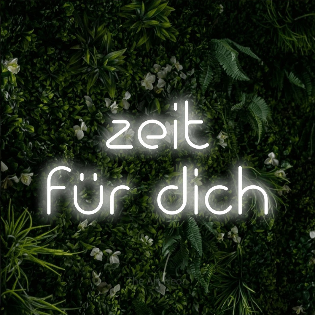 LED neon sign reading “zeit für dich”, arranged in 2 lines.