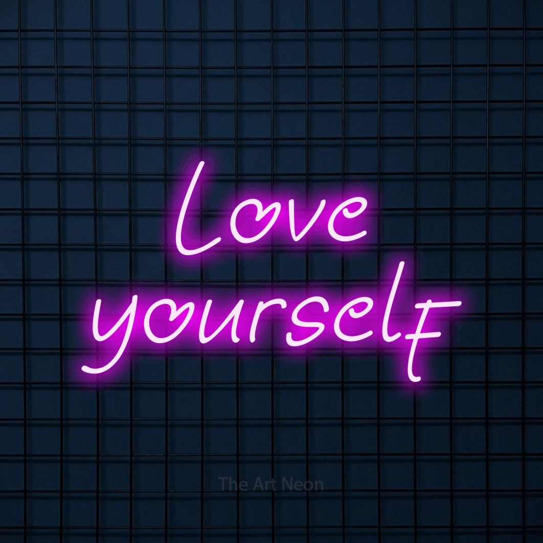 LED neon sign reading “Love yourself”, arranged in 2 lines.