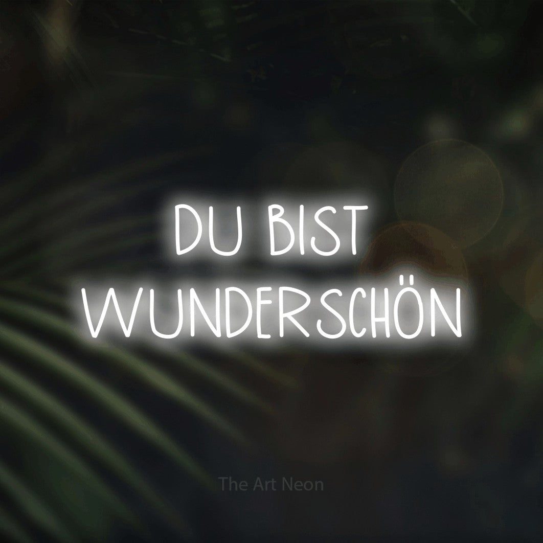 LED neon sign reading “DU BIST WUNDERSCHÖN”, arranged in 2 lines.