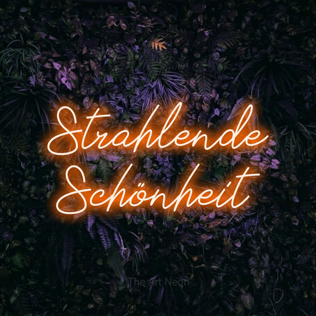 LED neon sign reading “Strahlende Schönheit”, arranged in 2 lines.