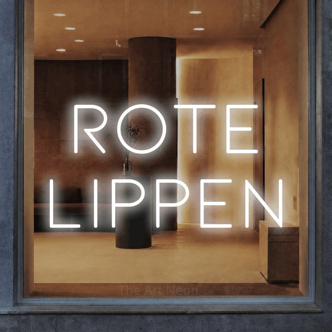 LED neon sign reading “Rote Lippen”, arranged in 2 lines.